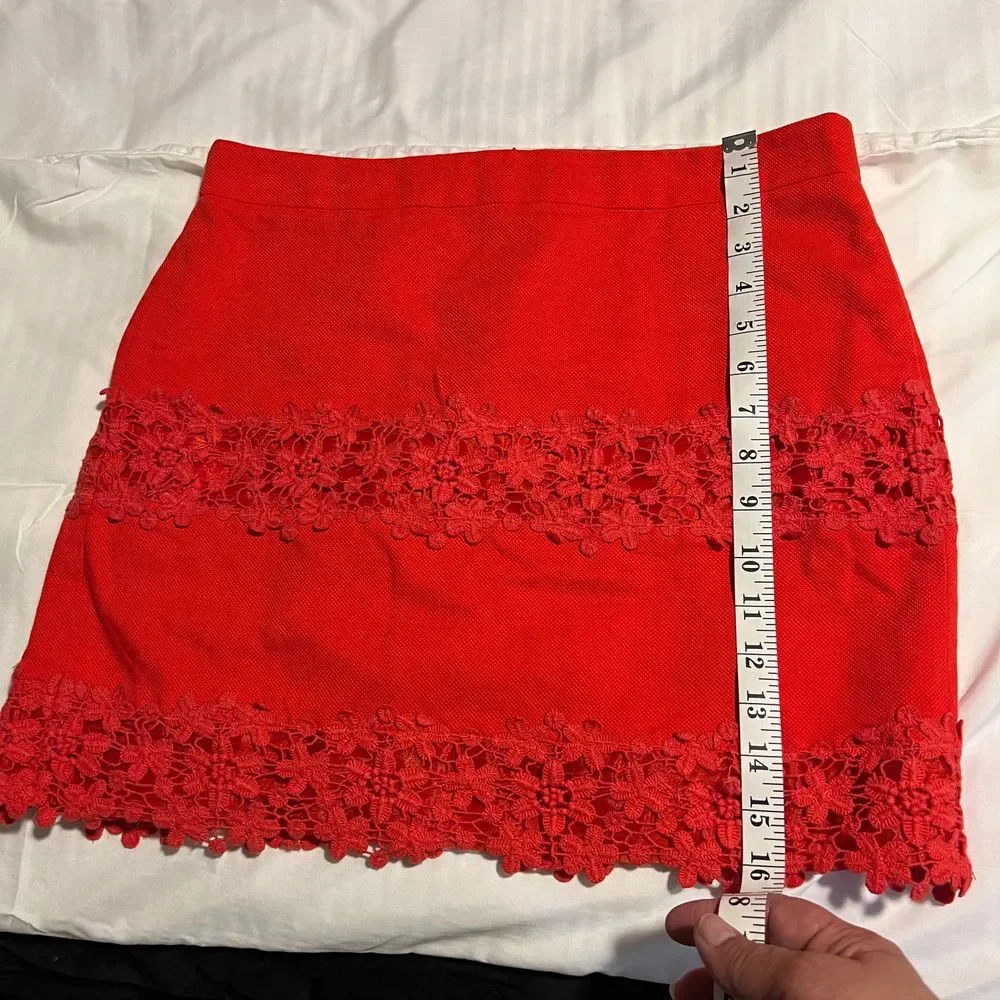 Elegant Red Mini Skirt with Floral Lace Trim Detail - Perfect for Evening Events